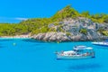 Cala Macarelleta Beach ÃÂ¡ove with Boats Floating on Water